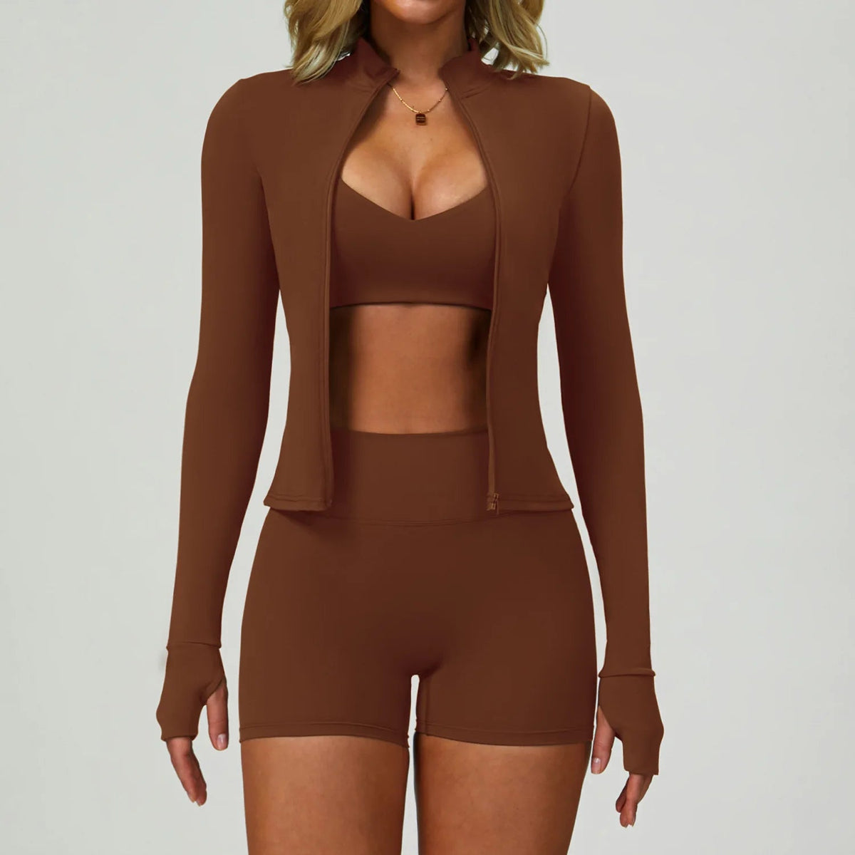 Brown matching activewear set with zip jacket and cropped top