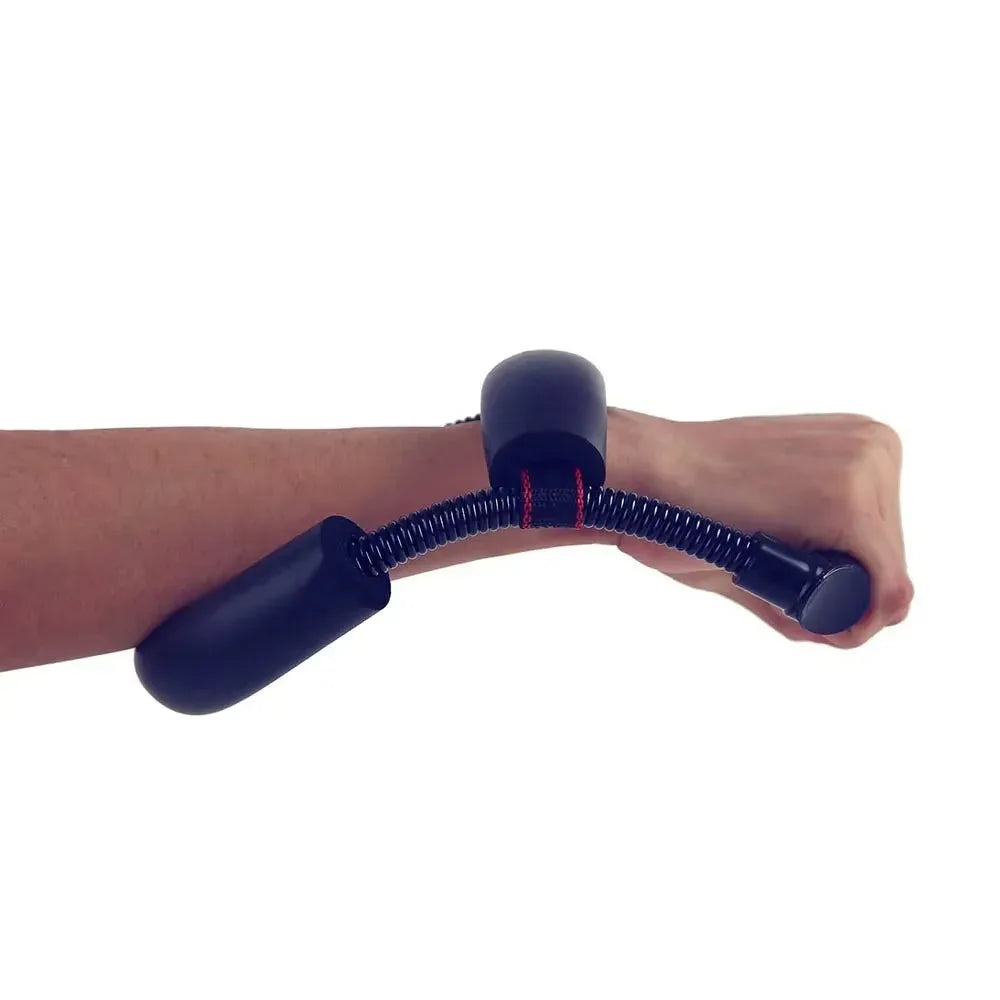 Person using forearm grip trainer outdoors