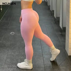 Women's seamless scrunch bum yoga leggings in pink, front view