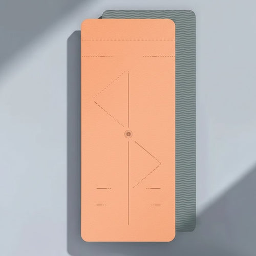 Orange non slip yoga mat with textured surface